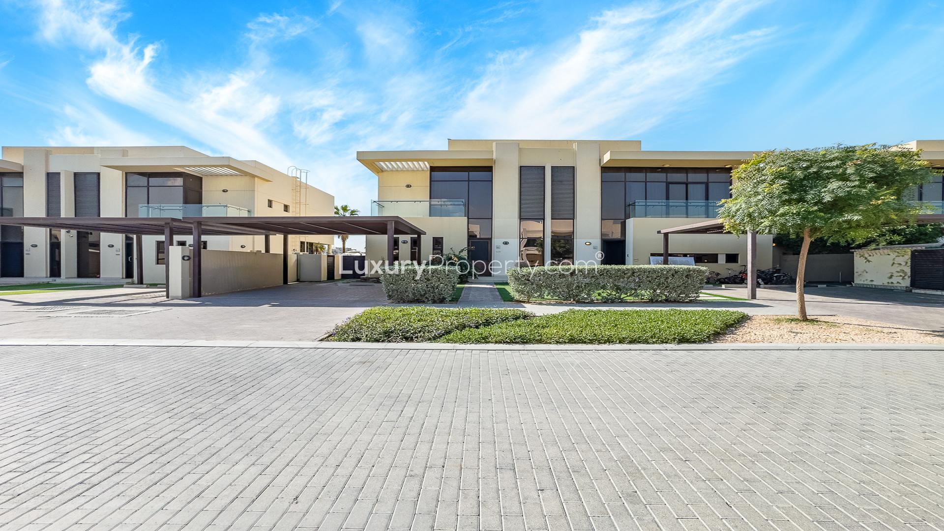 N/A,Modern townhouse with private garden in Richmond, Damac Hills, available for rent now