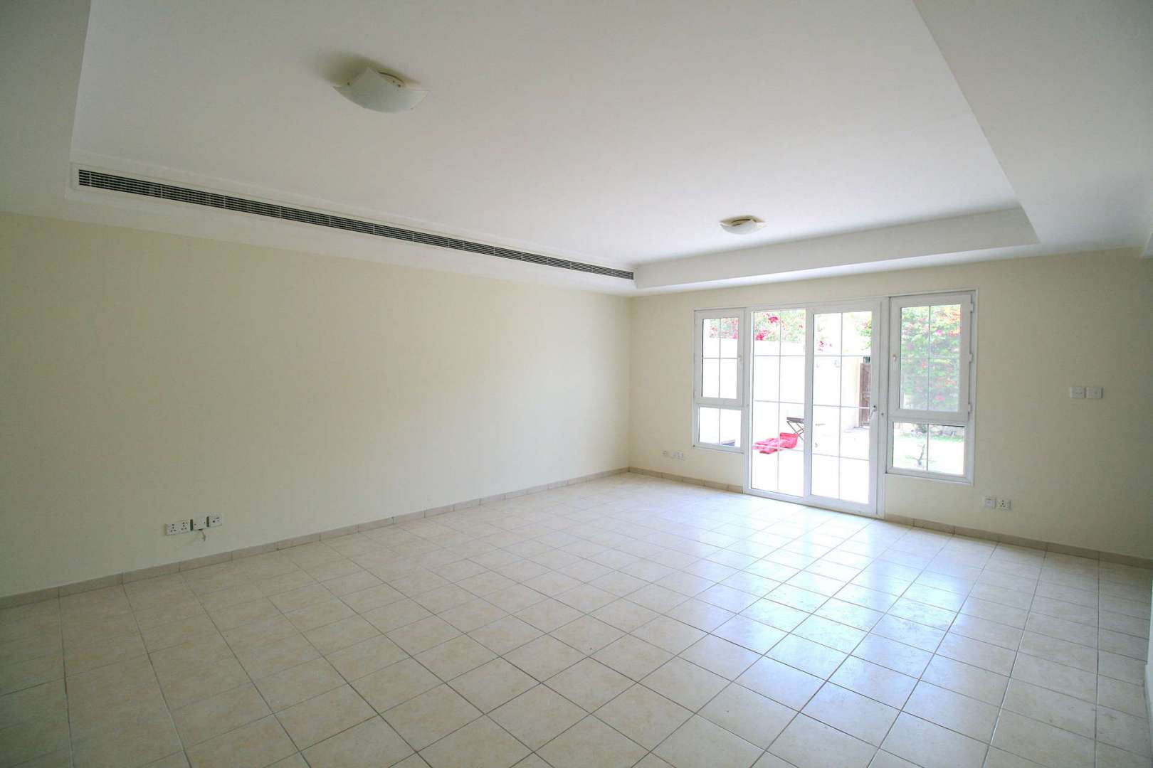 Family-friendly villa backyard with garden and play area in Al Reem 2, Arabian Ranches