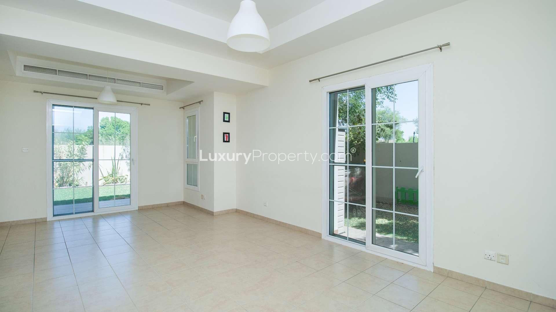 Extended townhouse in Al Reem, Arabian Ranches with upgraded flooring and landscaped garden for rent
