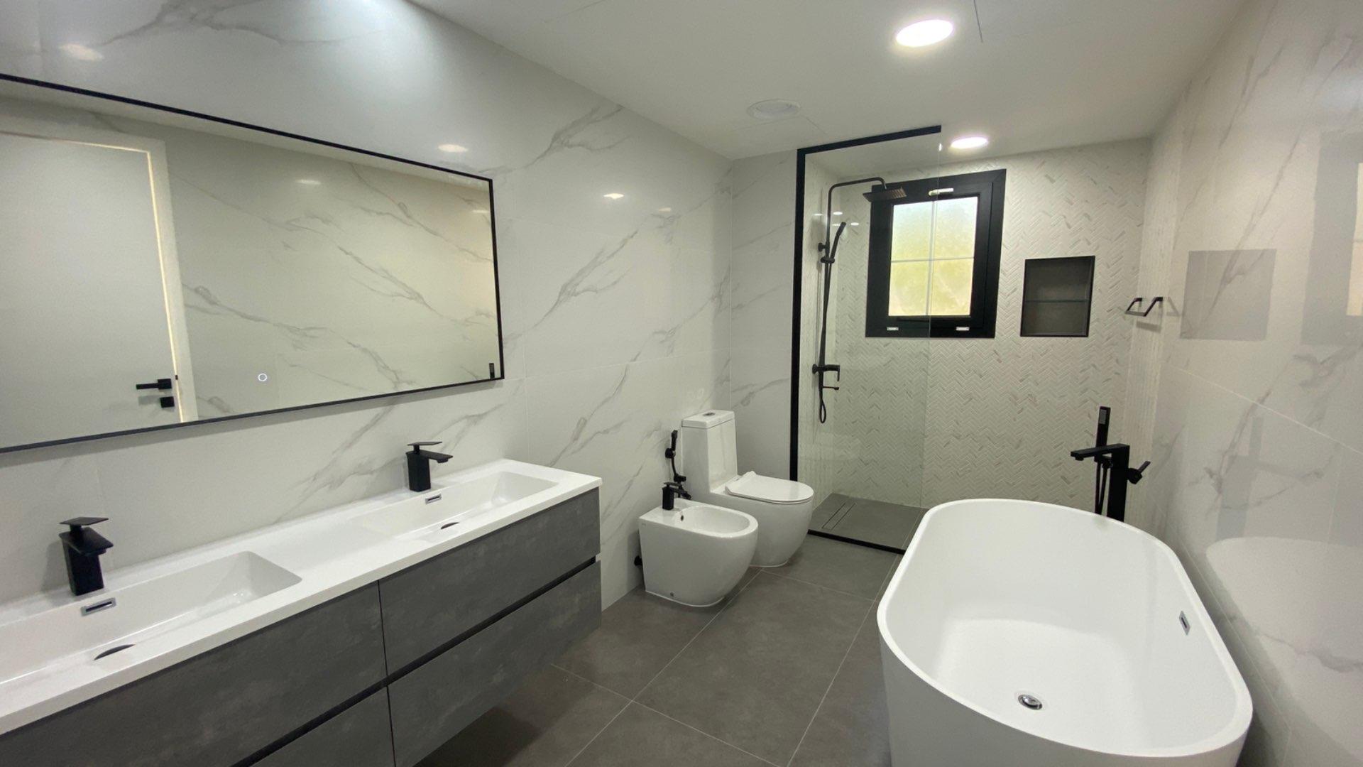 Modern bathroom with glass shower in 3-bedroom townhouse, Al Reem, Arabian Ranches