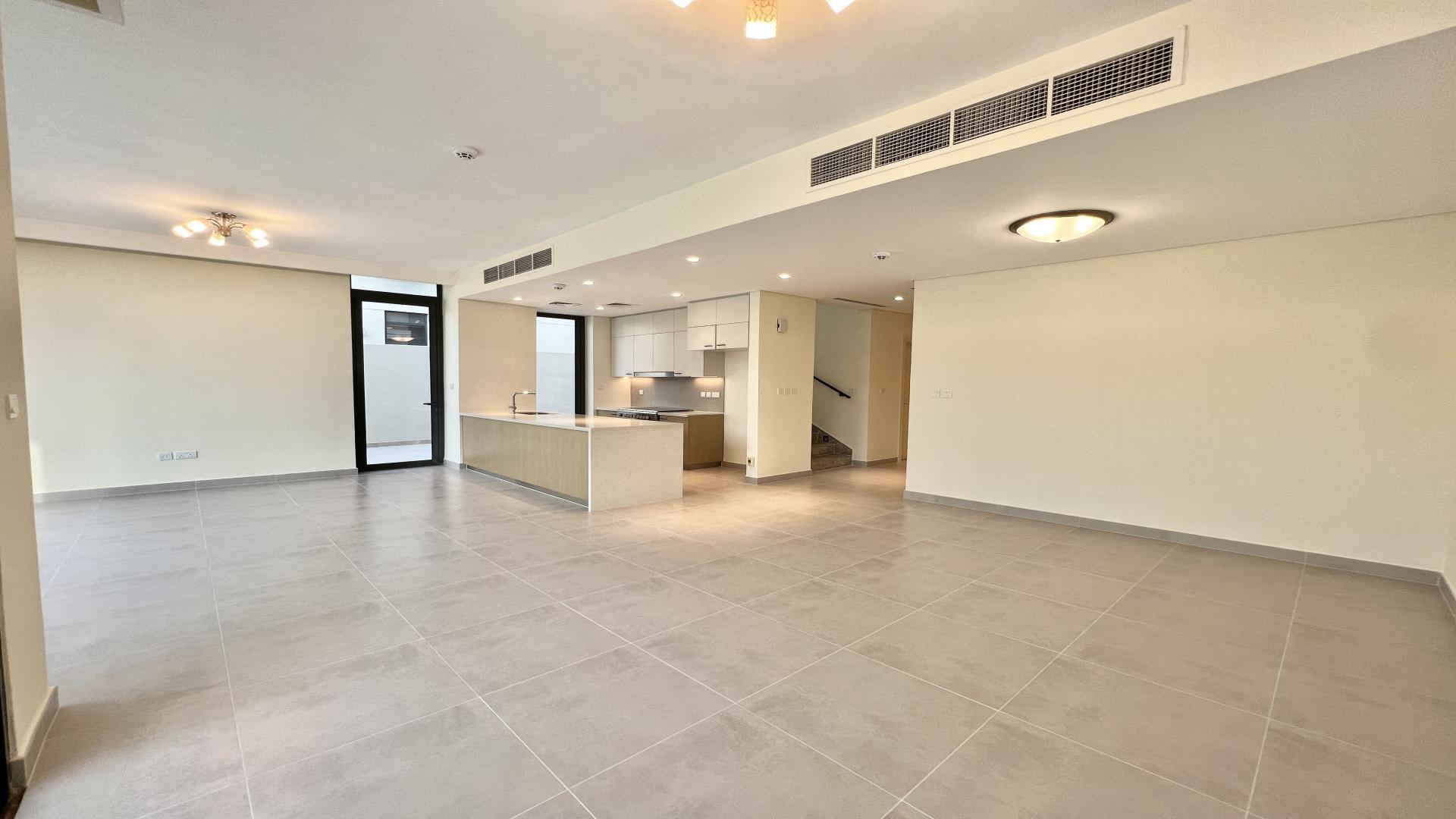 Open-plan kitchen and living area in Dubai Hills Estate 3-bedroom villa for rent