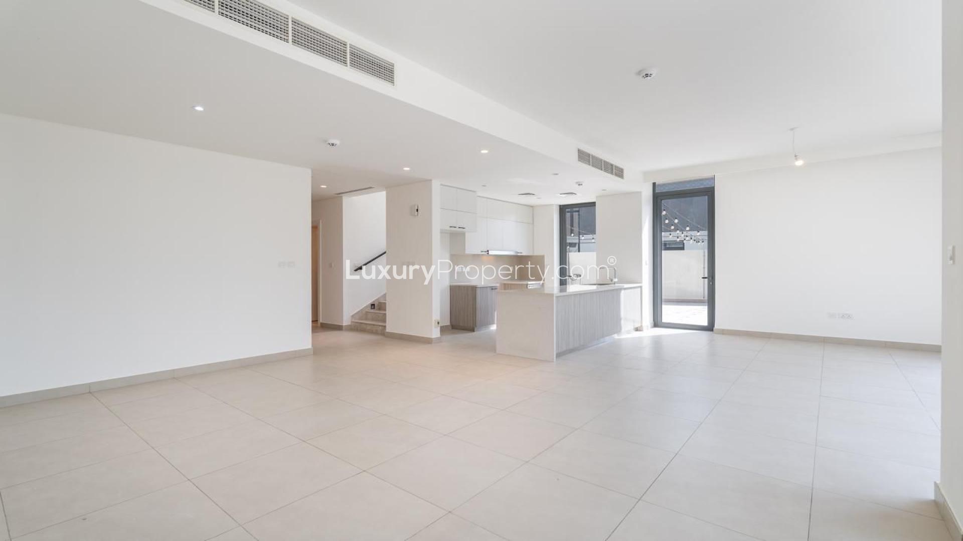 Modern 3-bedroom villa exterior with garden in Club Villas at Dubai Hills Estate