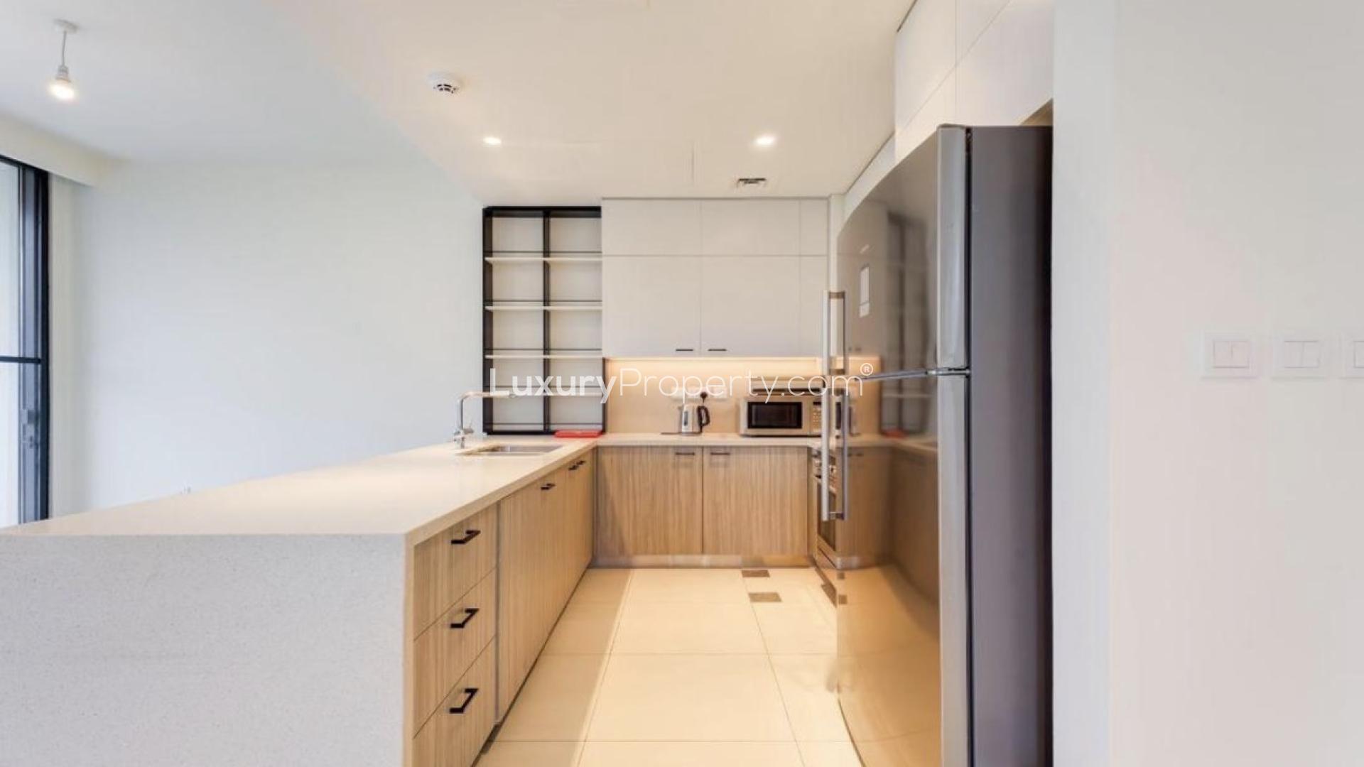 Modern living room in Club Villas townhouse, Dubai Hills Estate, featuring stylish furnishings