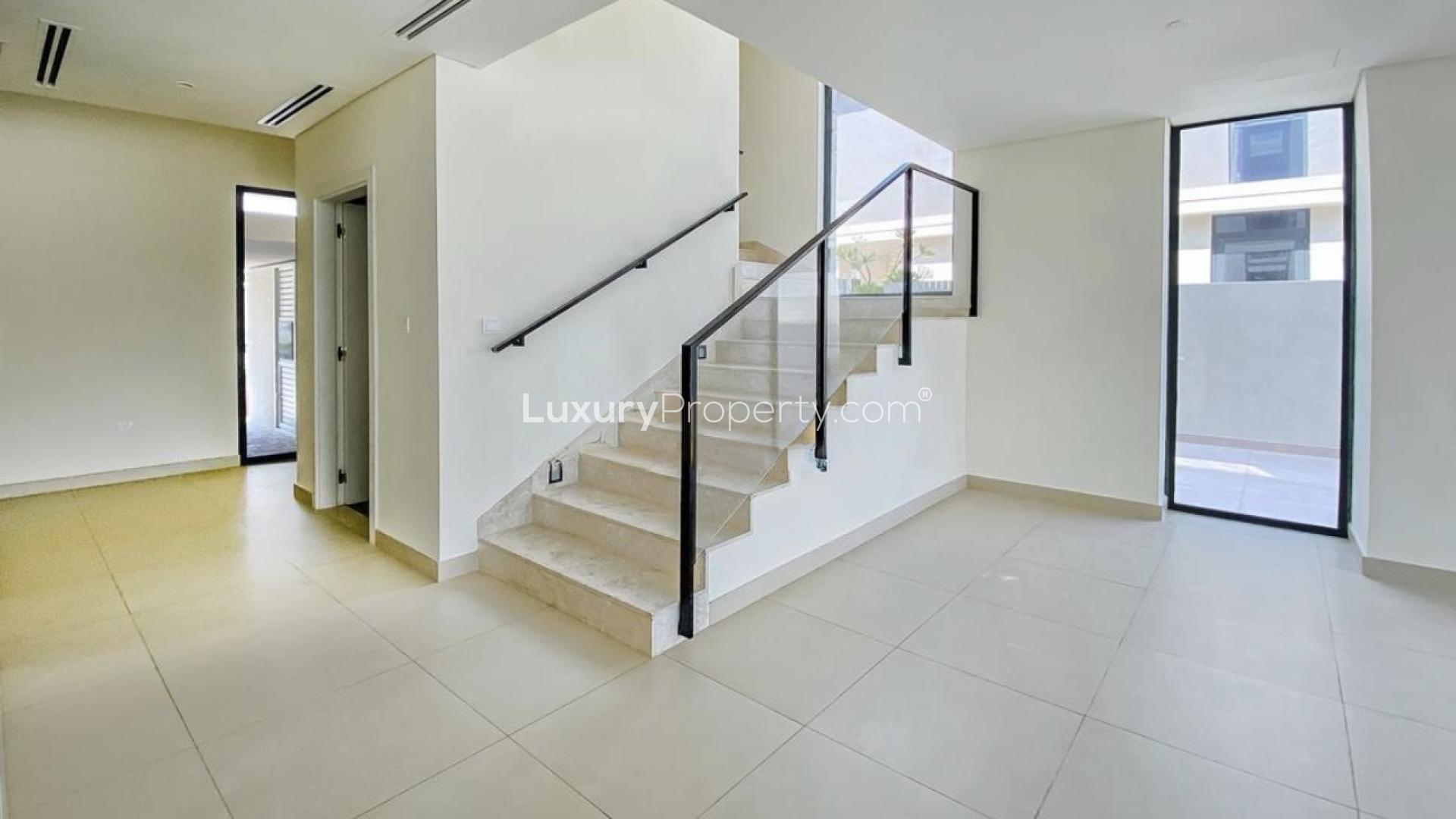 Modern kitchen and living area in Dubai Hills Estate townhouse for rent