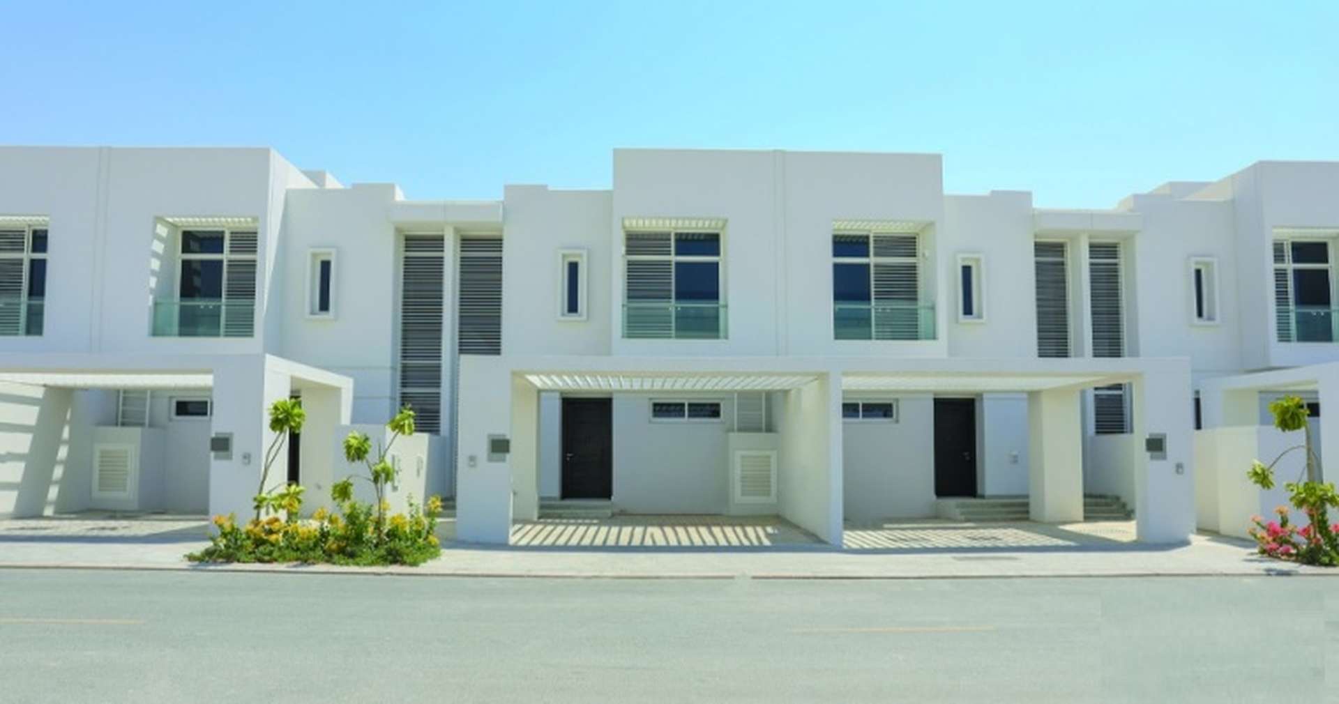 Modern townhouses in Arabella 1, Mudon community, showcasing spacious residential living environment