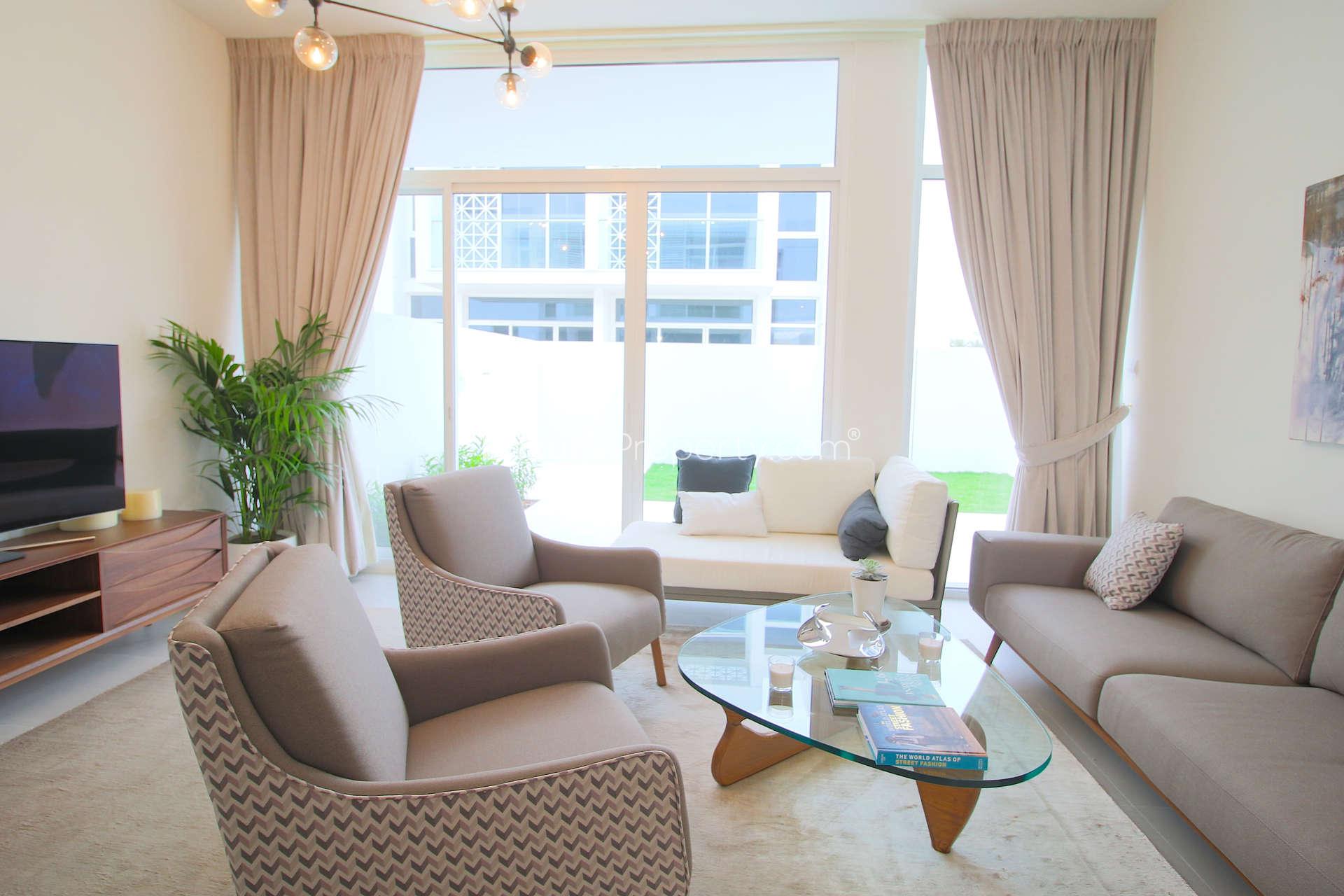N/A,Modern living room in 3-bedroom townhouse, Arabella 2, Mudon, with stylish furniture and decor