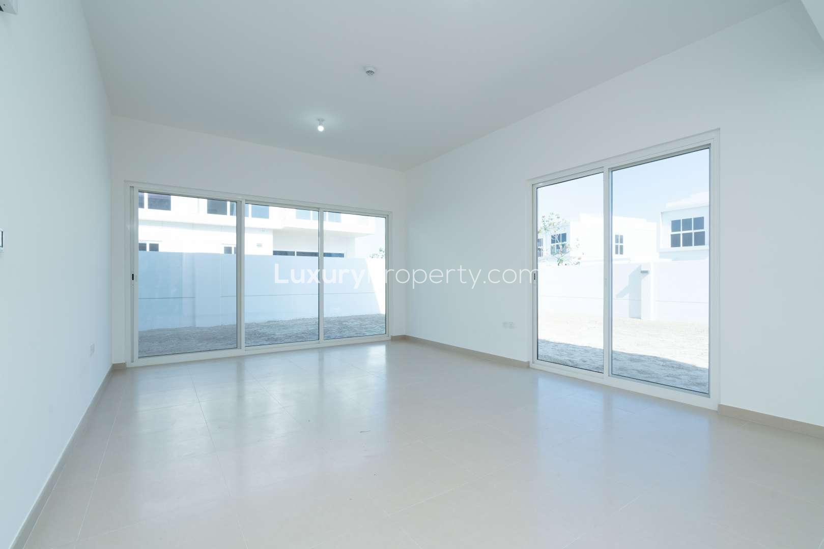 End unit townhouse with balcony and spacious yard in Arabella 3, Mudon community