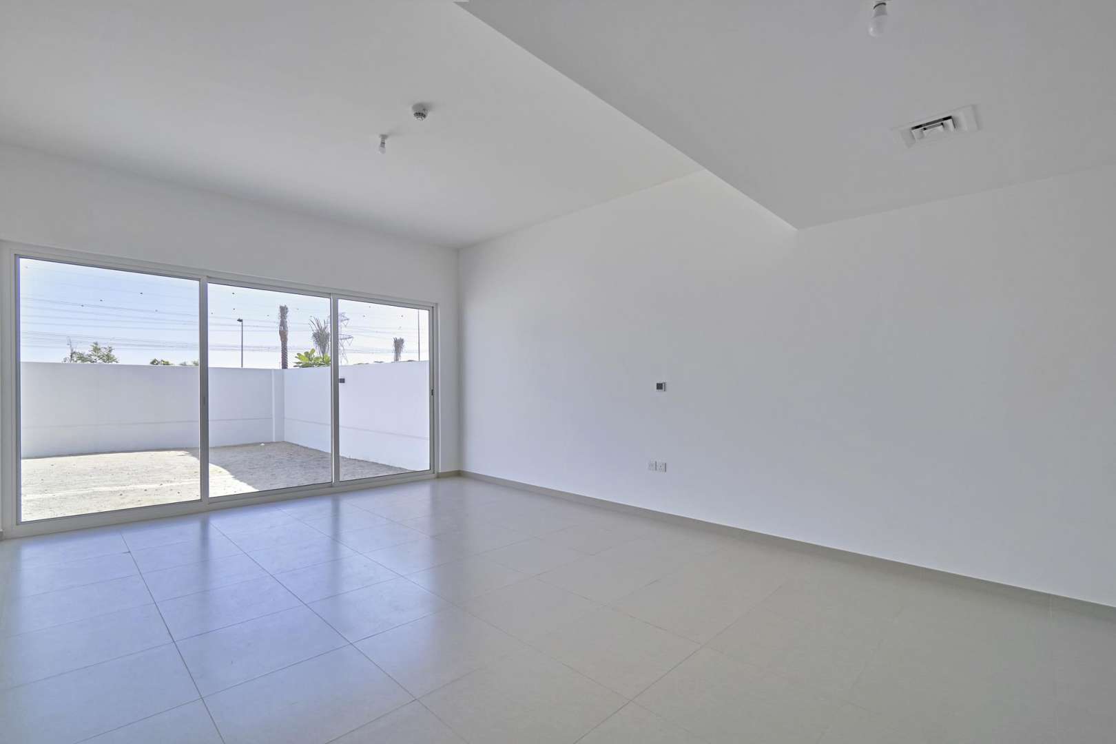 Spacious living area in 3-bed Arabella townhouse, Mudon, featuring modern design and ample light