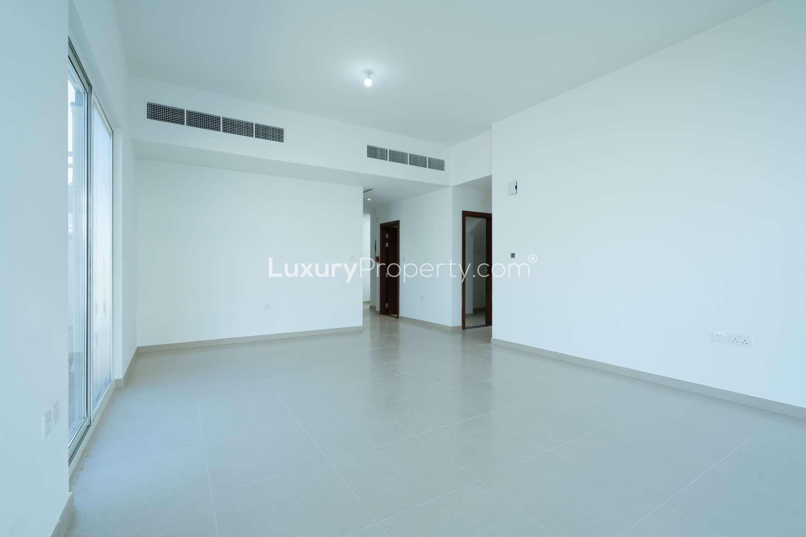 Sunlit living room in 3-bed townhouse, Arabella 3, Mudon, with large windows and bright interiors