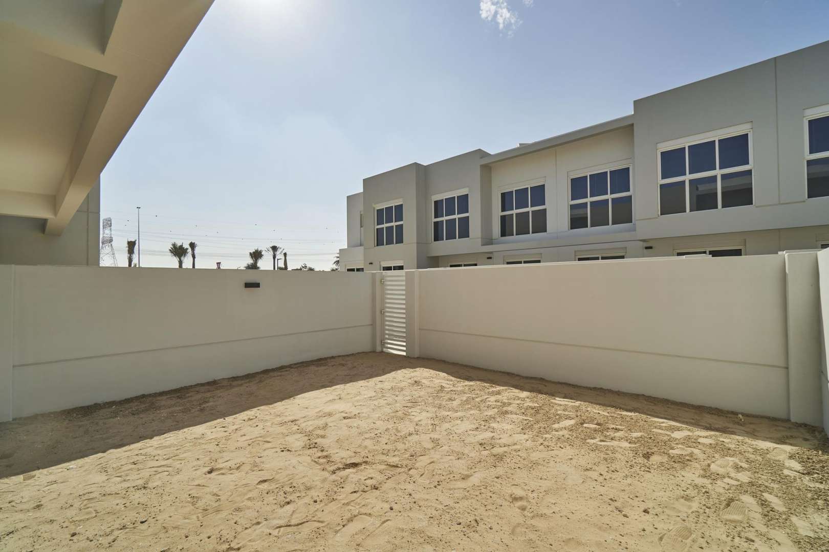 Charming 3-bedroom villa exterior in Arabella 3, Mudon, with spacious backyard for rent