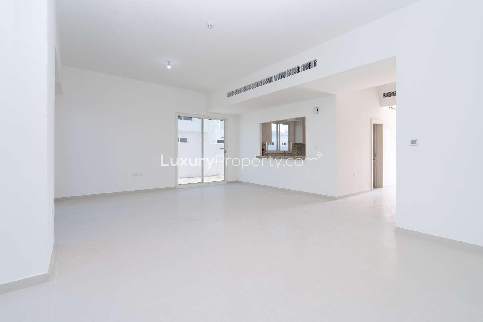 Three-bedroom semi-detached townhouse exterior in Arabella 3, Mudon for rent