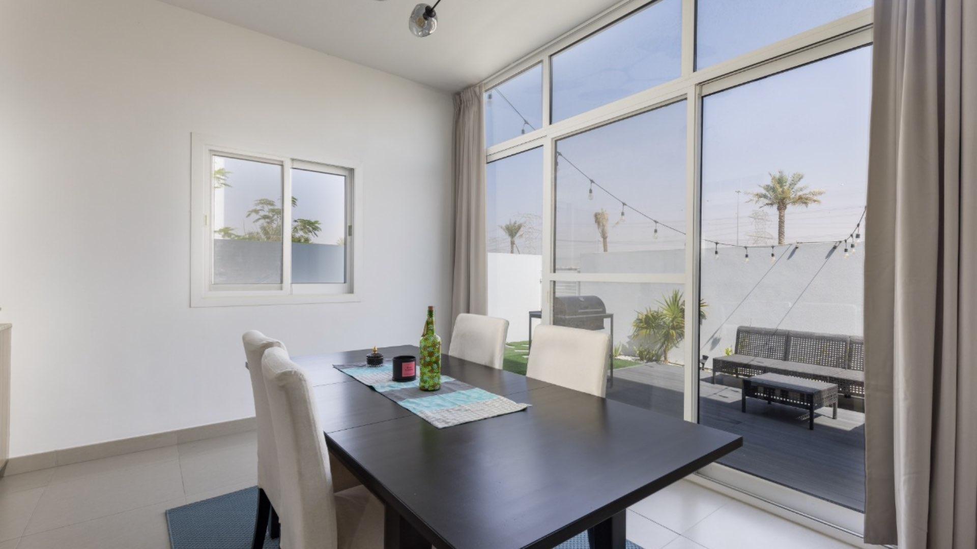 Bright living room in 3-bedroom townhouse, Arabella, Mudon with modern decor and large windows