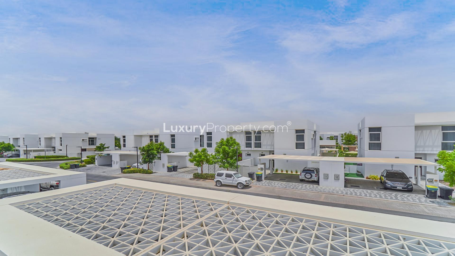 Spacious living room with large windows in Arabella 1 townhouse, Mudon for rent