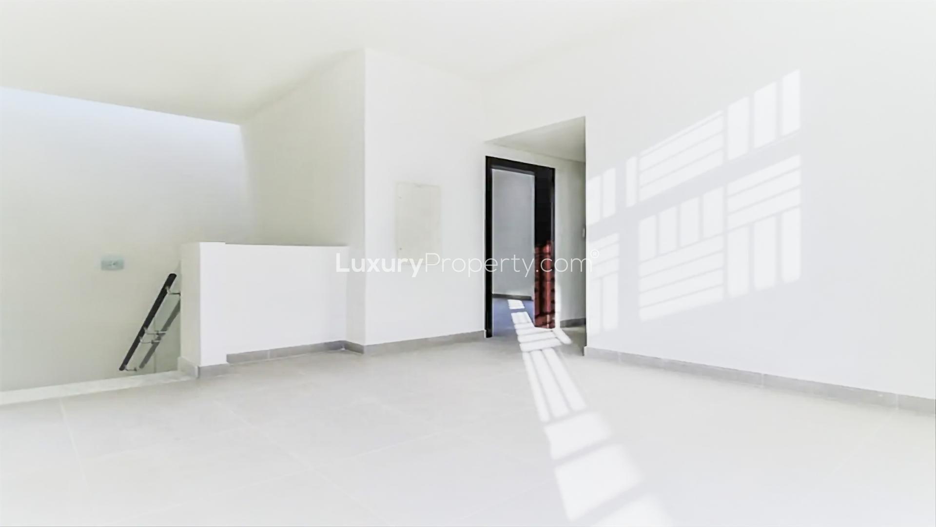 Private pool with sun loungers at Arabella 2 townhouse in Mudon community