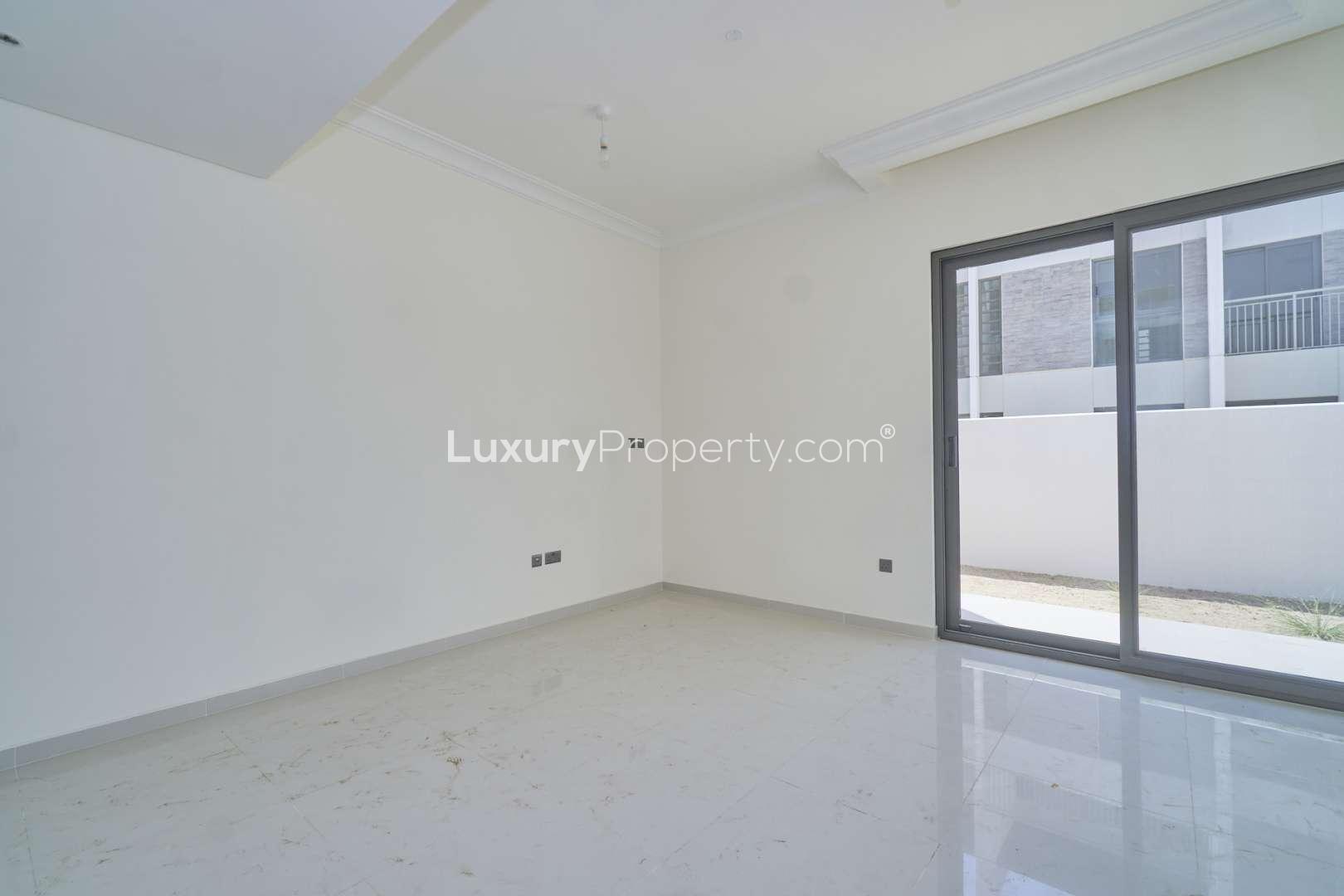 Empty interior of 3-bedroom townhouse for rent in Damac Hills 2, Aster community