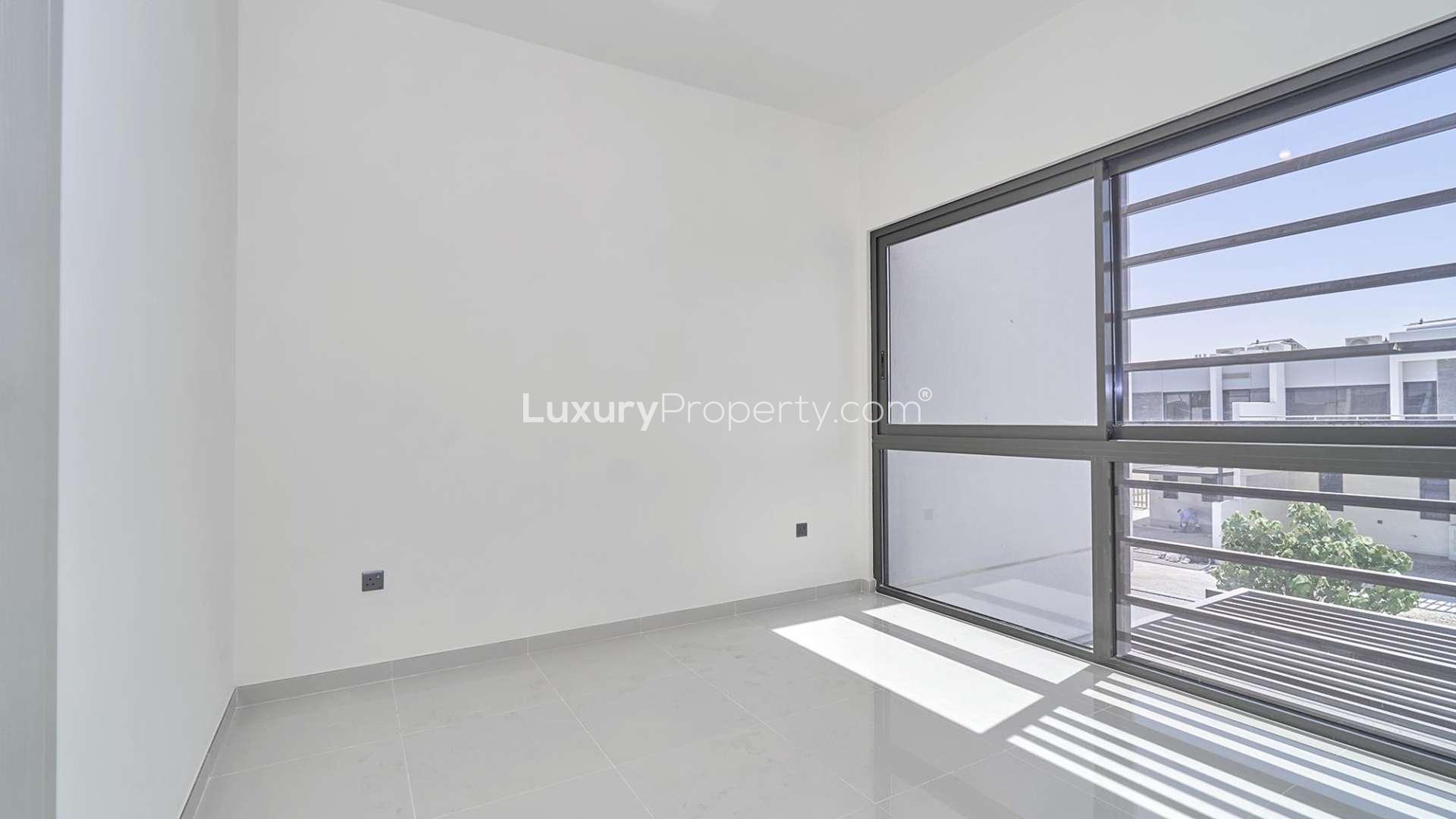 Empty living room in 3-bedroom townhouse, Aster, Damac Hills 2, available for rent