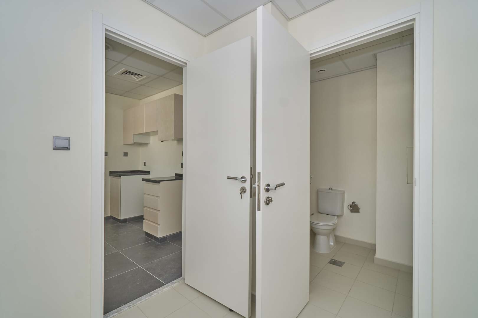 Modern kitchen and bathroom in Aster townhouse, Damac Hills 2, available for rent