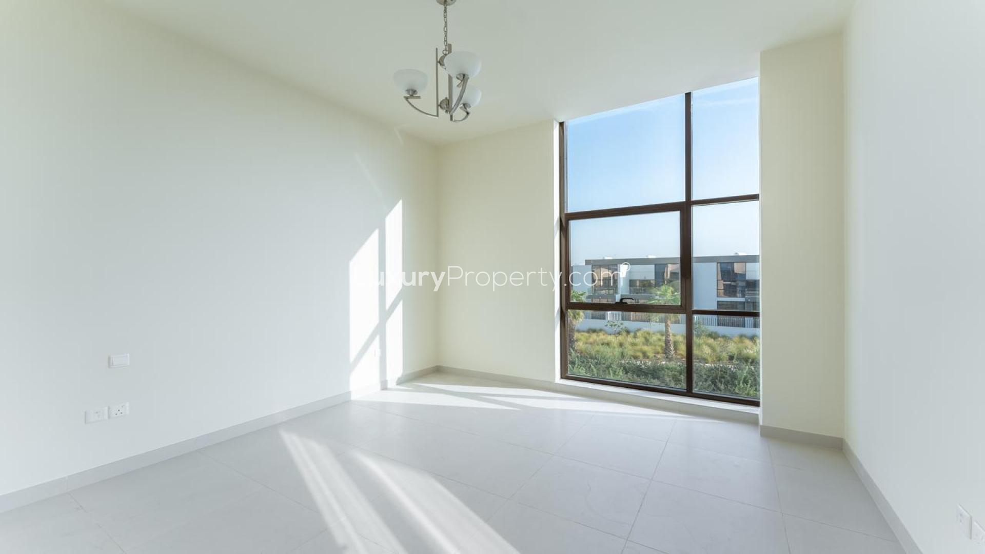 Brand-new townhouse exterior in Senses at the Fields, MBR City, District 11 for rent