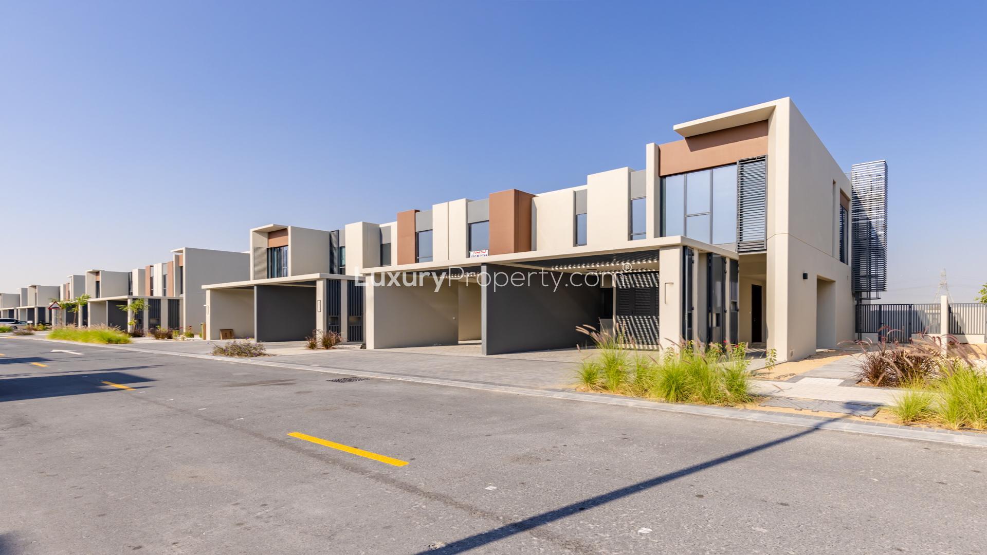 Open-plan kitchen and living area in Cherrywoods townhouse, Dubailand, for rent