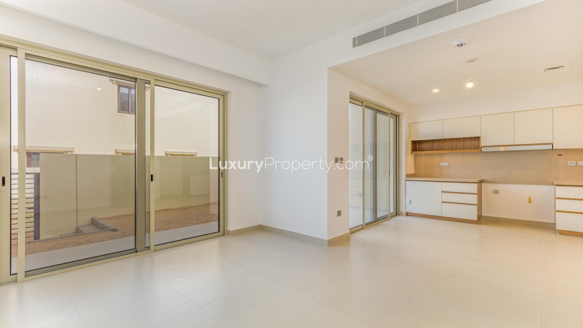 "Modern townhouse exterior in Camelia, Arabian Ranches 2, available for rent, LP13797 listing.",Brand new kitchen and living area in Camelia townhouse, Arabian Ranches 2 for rent