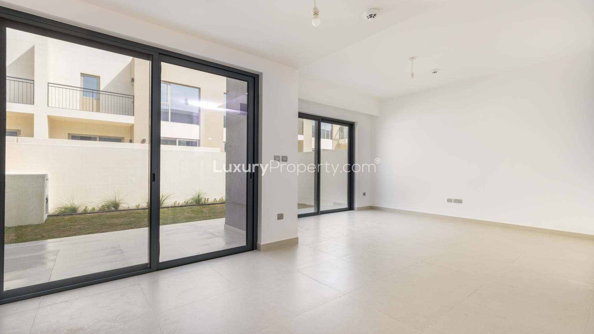 Brand new kitchen in Camelia townhouse, Arabian Ranches 2, with modern design and sliding doors