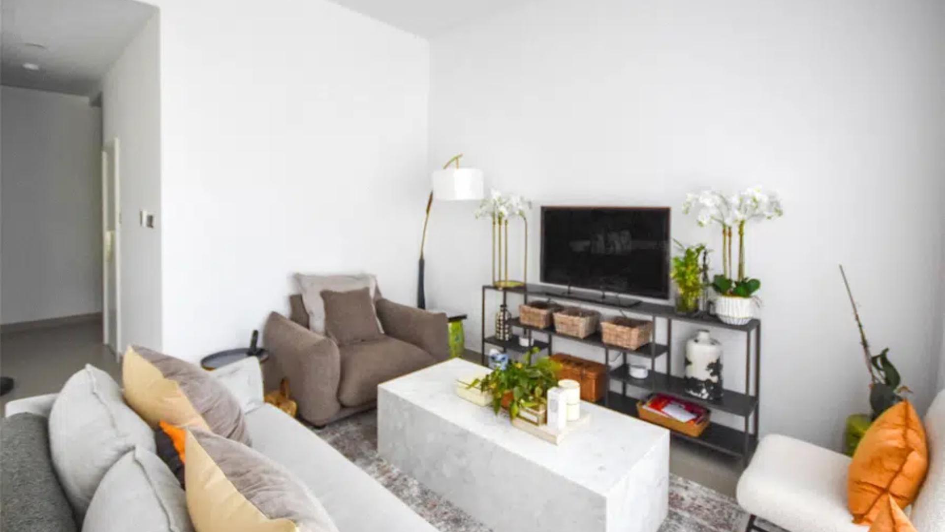 Outdoor swimming pool at Camelia, Arabian Ranches 2 townhouse community in Dubai