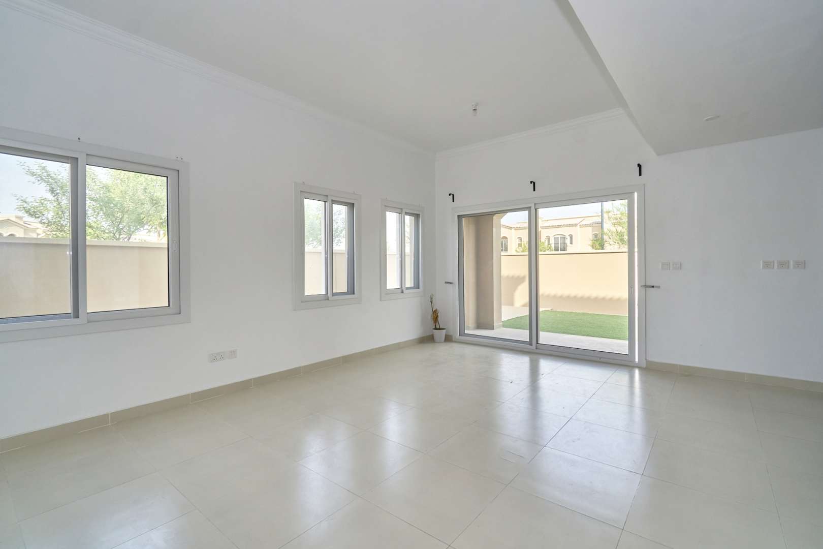 Townhouse exterior with private yard in Casa Dora, Serena, available for rent