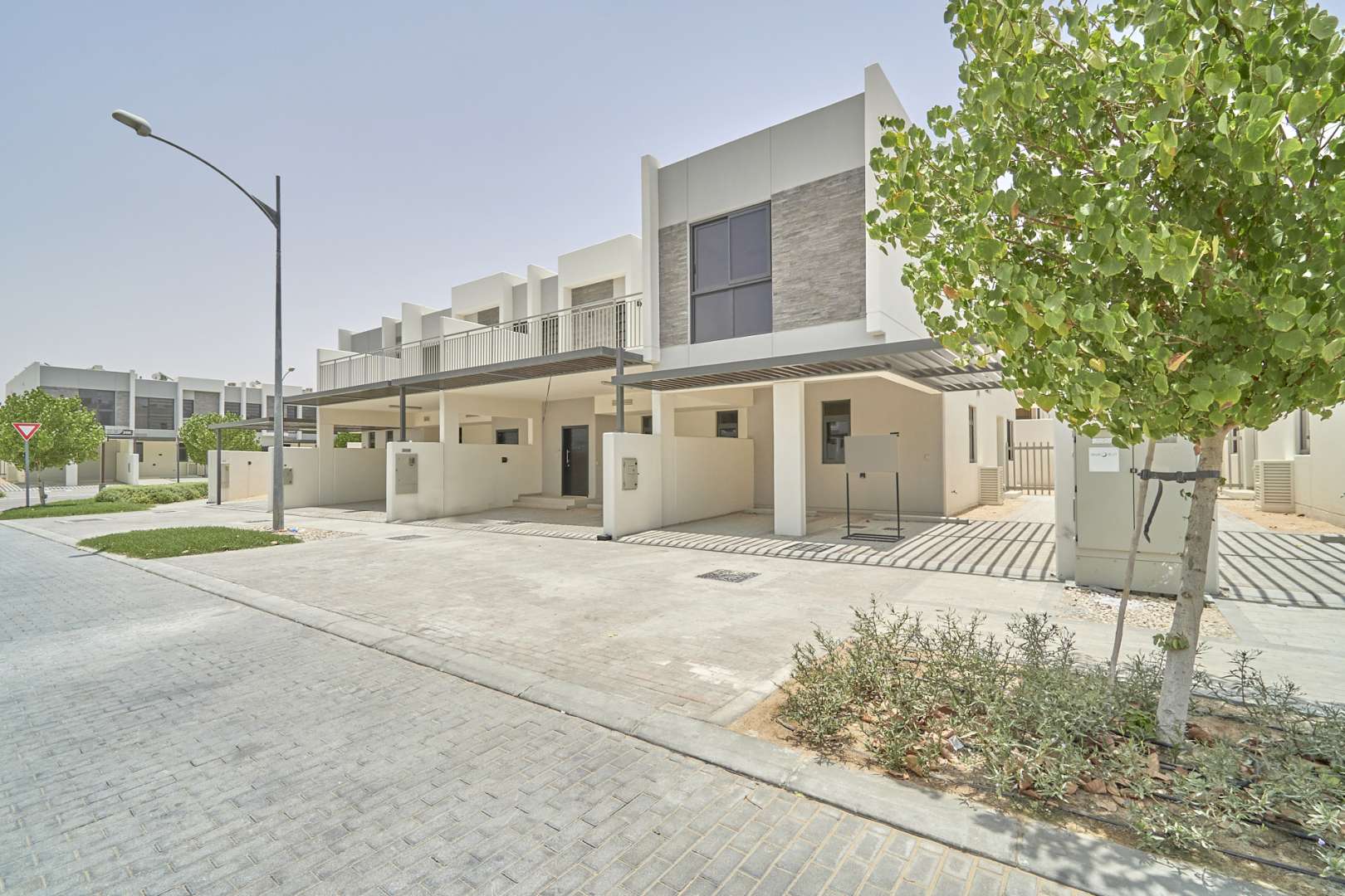 Brand new three-bedroom townhouse exterior in Coursetia, Akoya Oxygen, available for rent