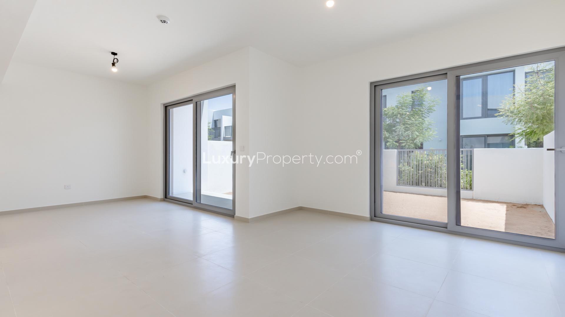 Modern 3-bedroom townhouse exterior in Elan, Tilal Al Ghaf, Dubai, available for rent