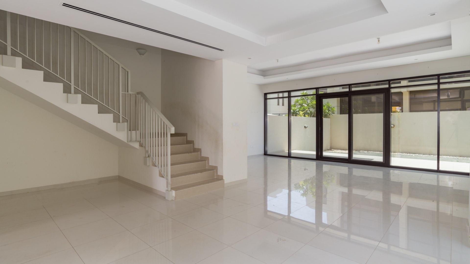 Family-friendly 3-bedroom townhouse with landscaped garden in Damac Hills, Flora sub-community