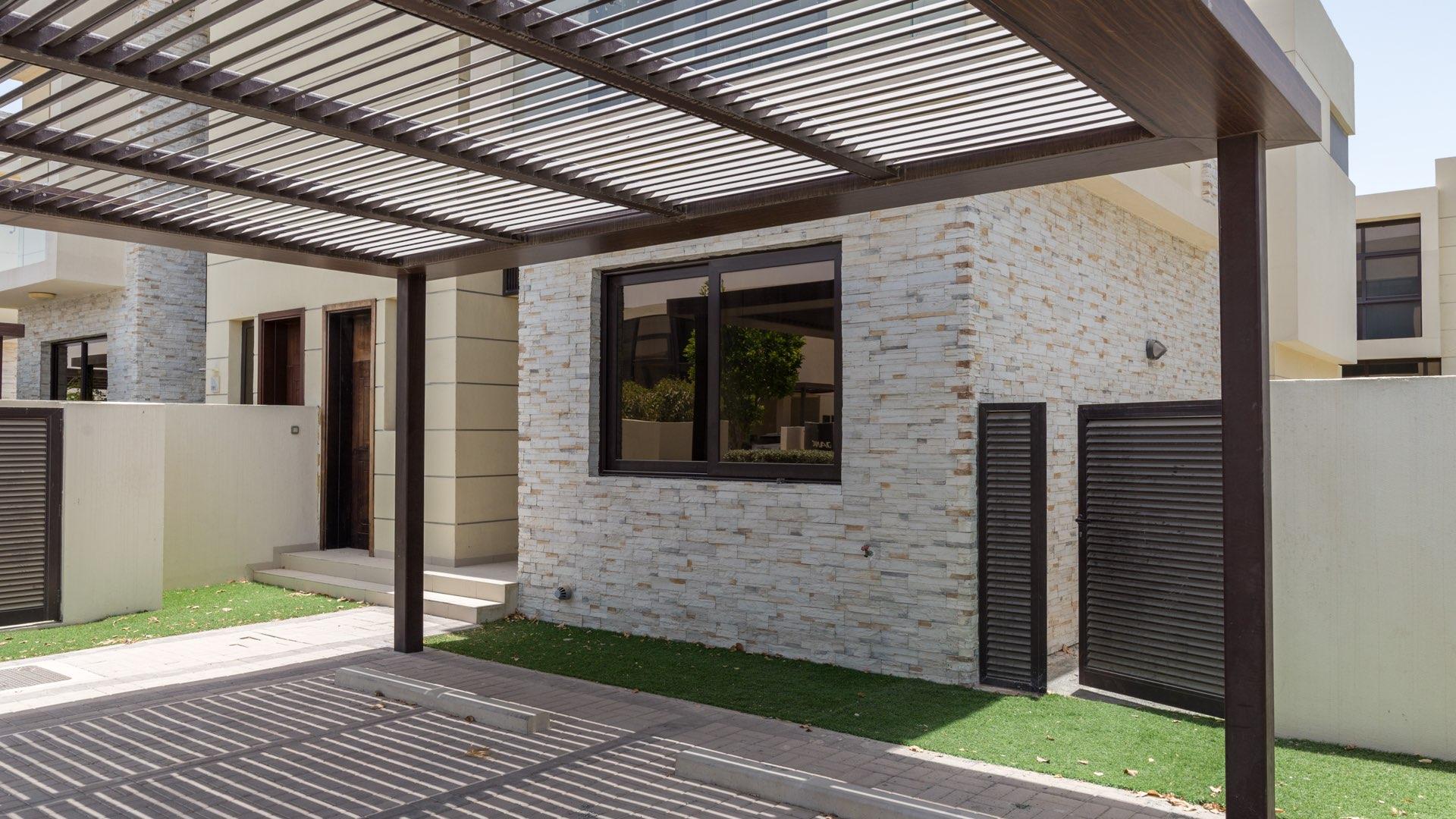 Family-friendly townhouse in Damac Hills with landscaped garden, Flora sub-community, for rent