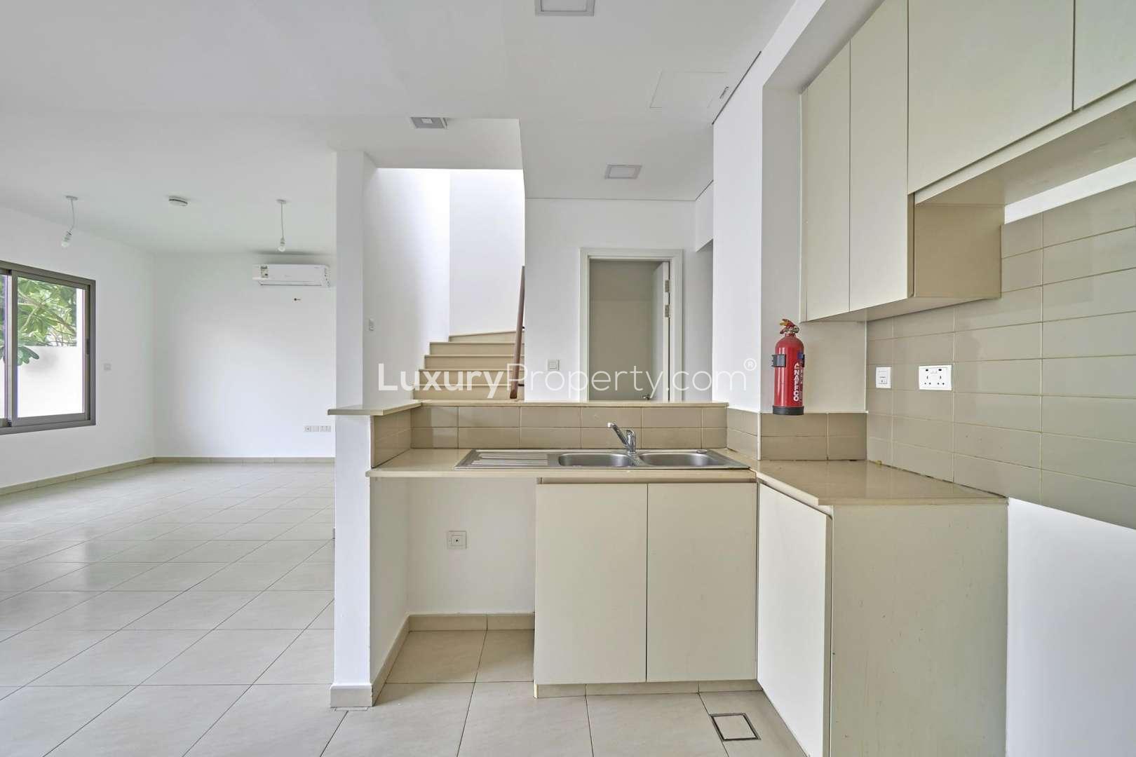 Modern kitchen and stairs in three-bedroom townhouse, Hayat, Town Square for rent