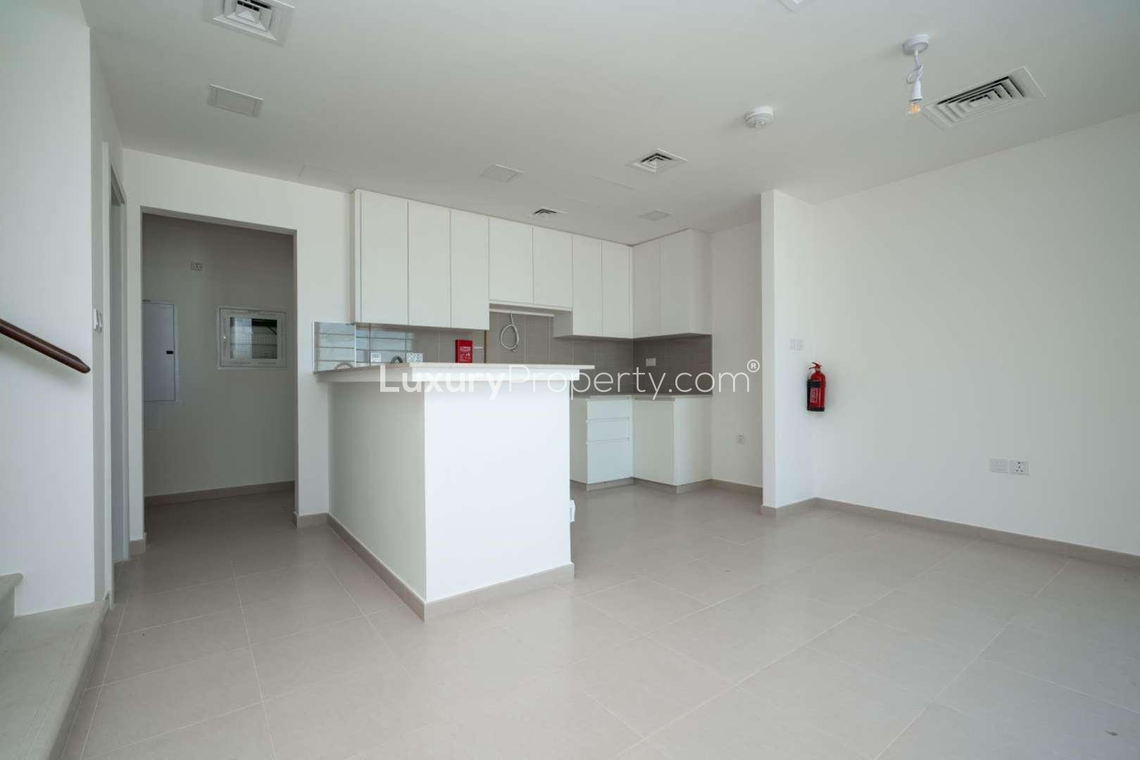 Modern kitchen and staircase in spacious Type 6 townhouse, Hayat, Town Square for rent