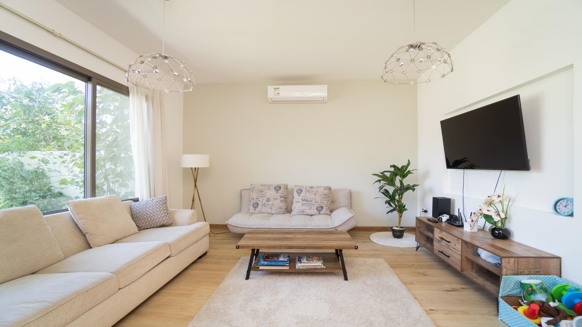 Beautifully landscaped backyard of 3-bedroom townhouse in Hayat, Town Square for rent