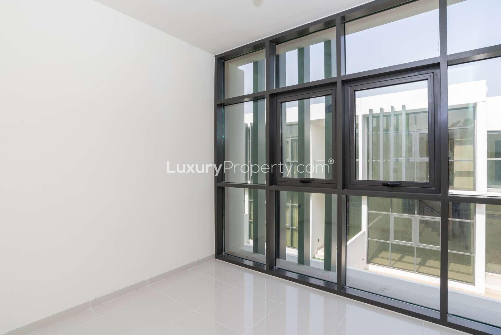 Newly built townhouse window view in Janusia, Damac Hills 2, bright and spacious interior