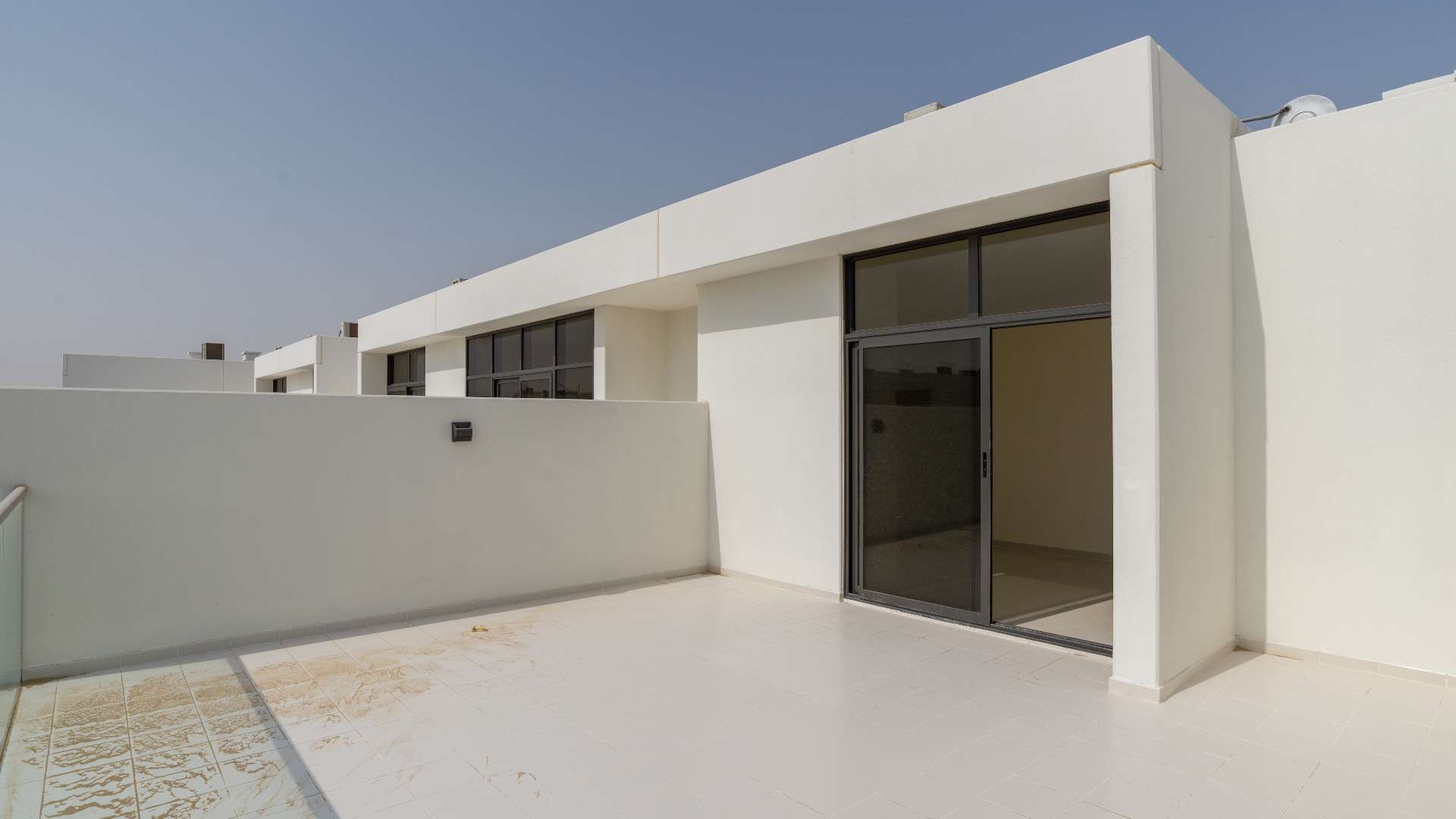 Bright living area with large windows in Janusia townhouse, Damac Hills 2 for rent