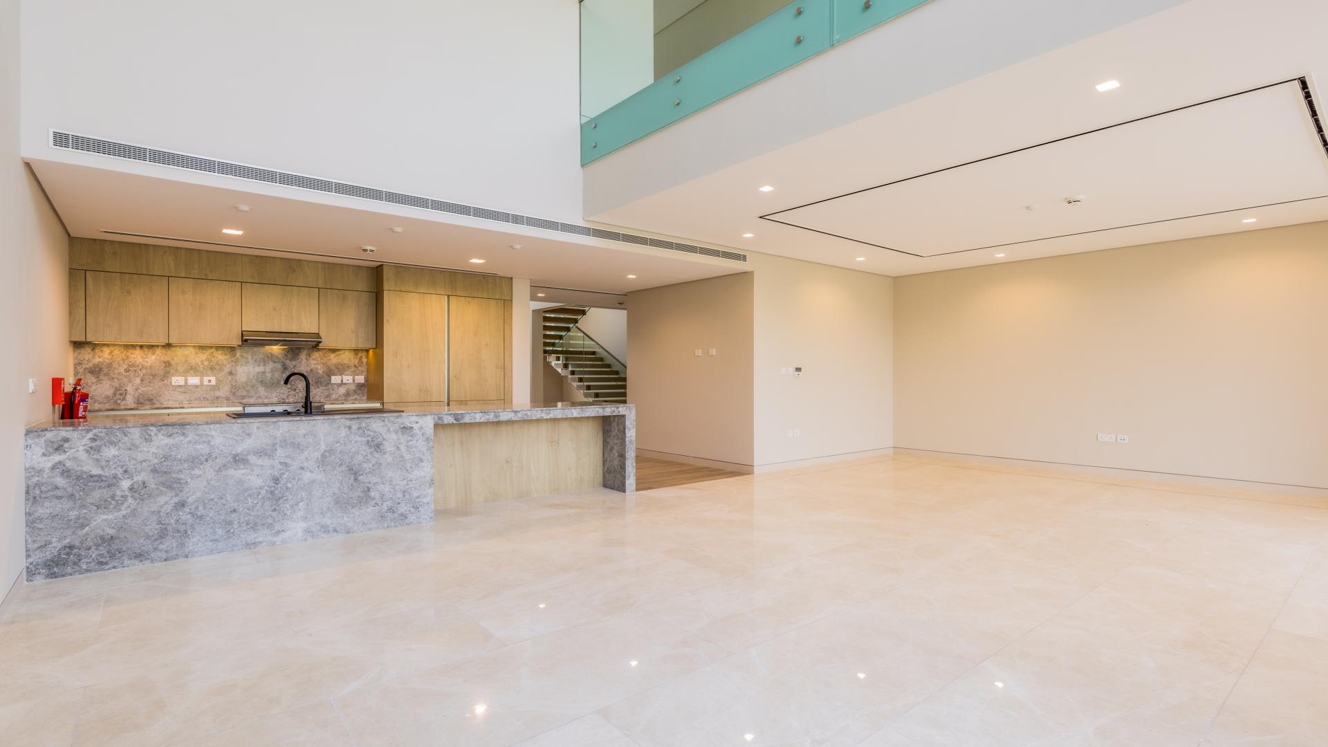 Modern townhouse exterior in Villa Amalfi, Jumeirah Bay Island, available for rent