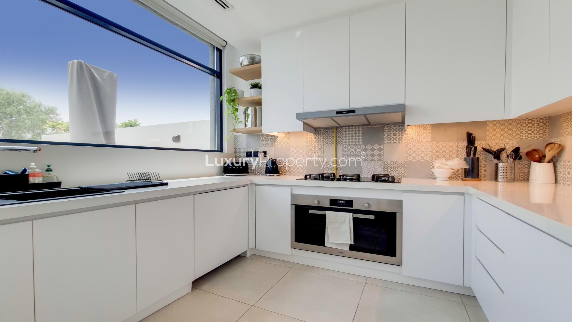 Elegant living room in 3-bedroom townhouse, Jumeirah Golf Estates, modern decor, open space design