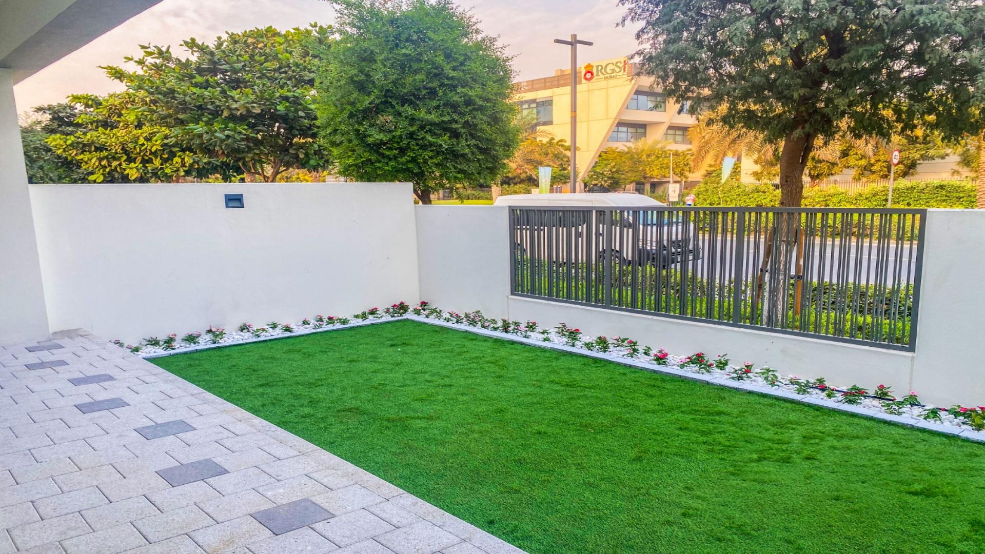 Modern staircase and bright interior of townhouse in Aura Gardens, Tilal Al Ghaf for rent