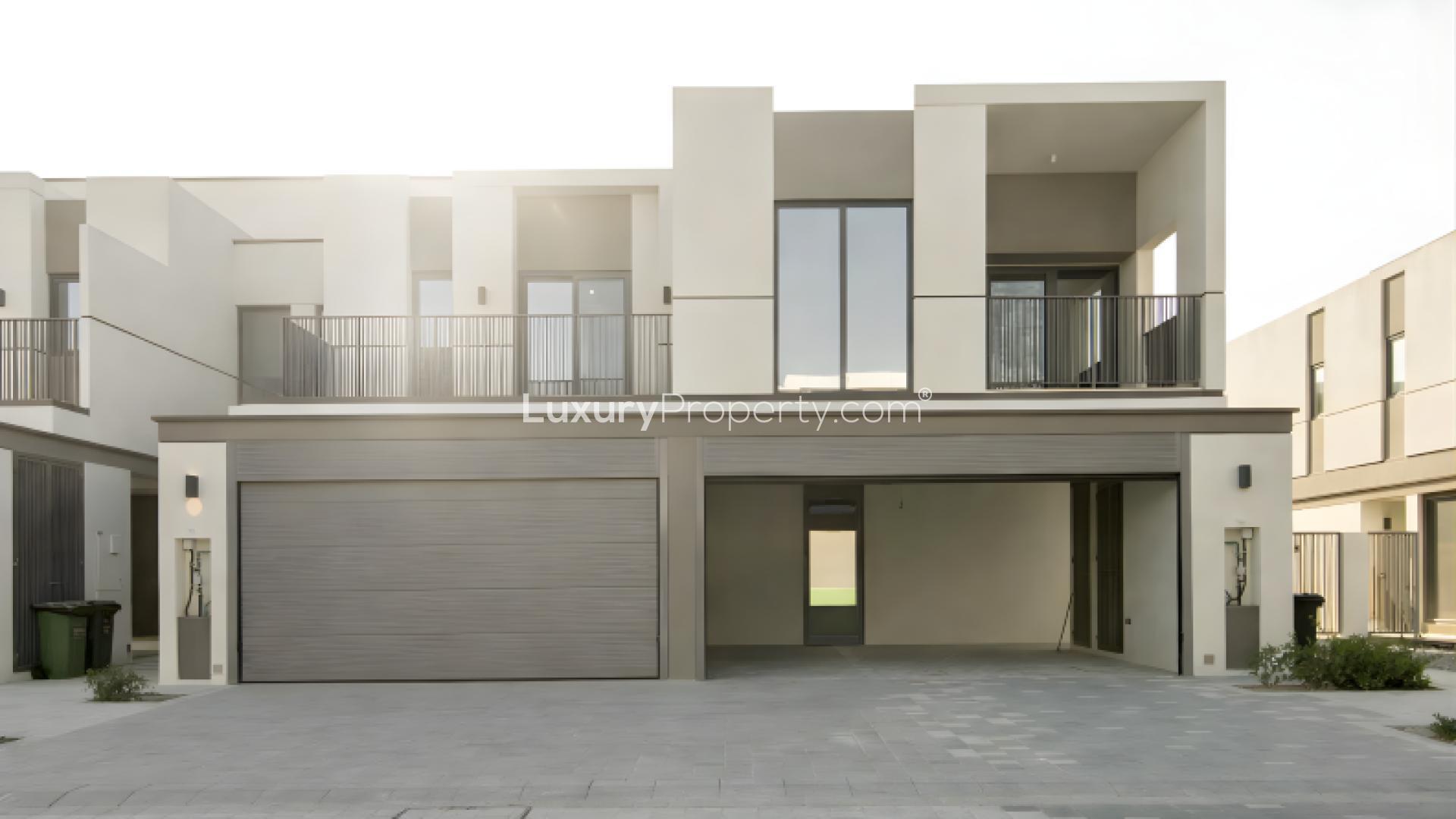 Modern kitchen in 3-bedroom townhouse for rent at Aura 3, Tilal Al Ghaf