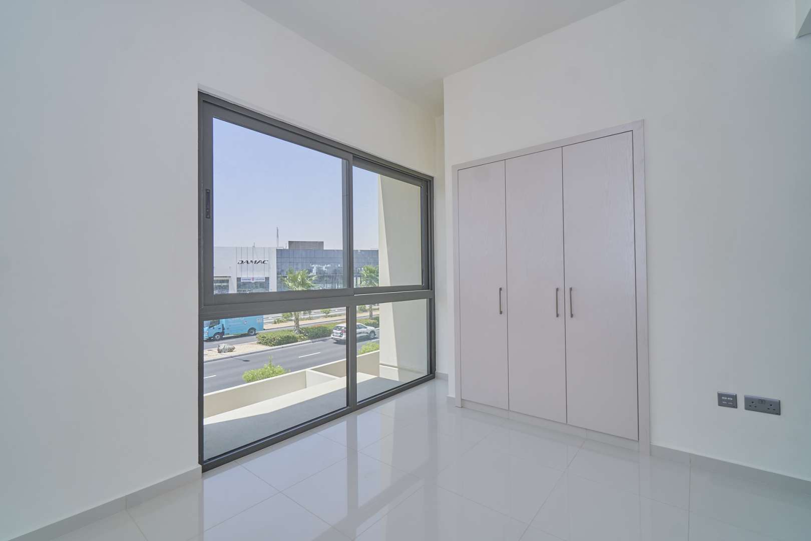 Modern kitchen in 3-bedroom townhouse, Juniper, Damac Hills 2, with sleek cabinets and countertops