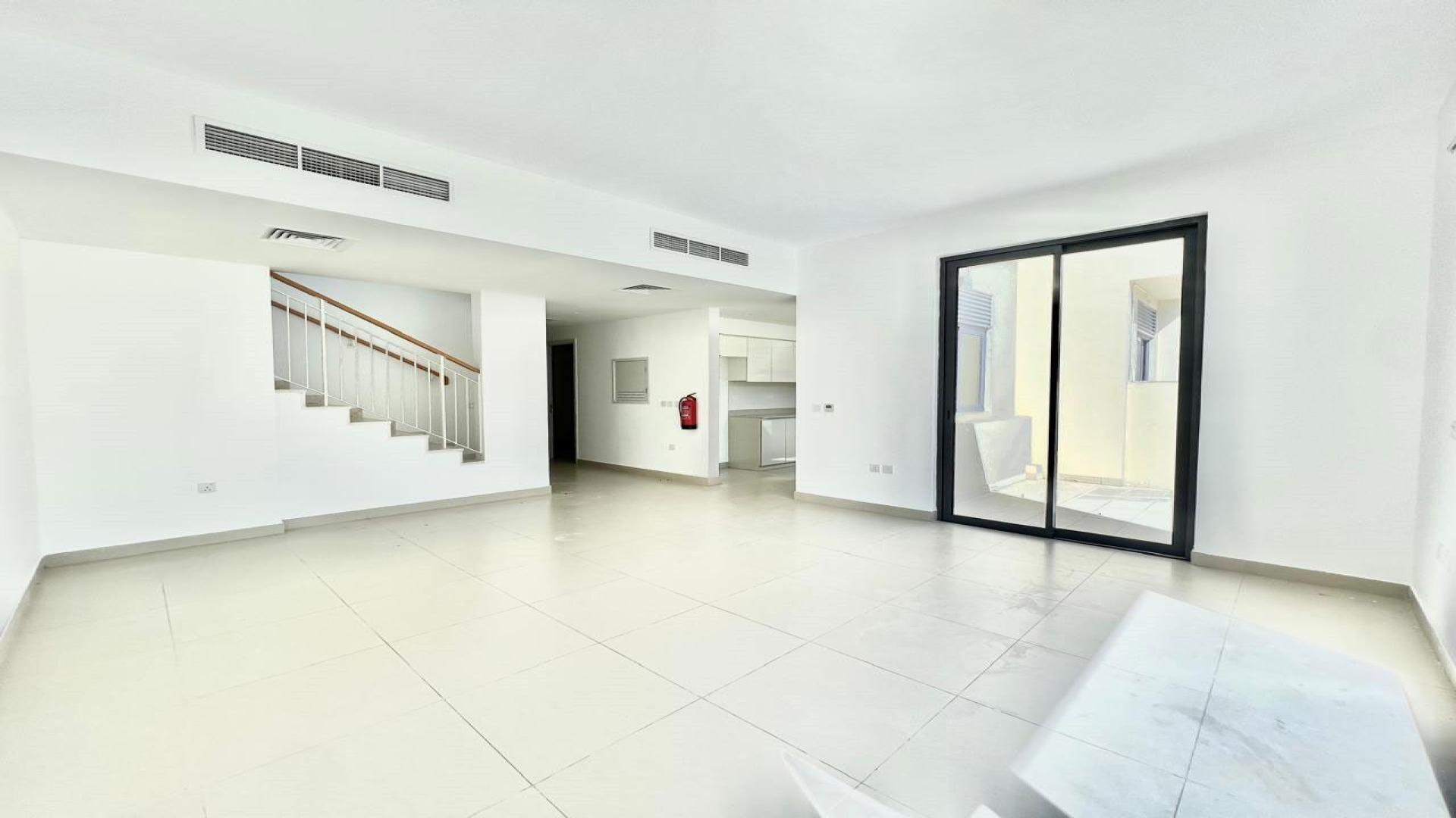 Open living area in 3-bedroom villa, Maple 2, Dubai Hills Estate, with modern finishes