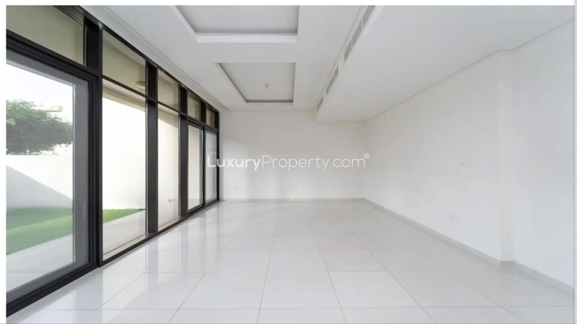 Modern 3-bedroom townhouse exterior in Akoya Park, DAMAC Hills for rent. Ref: LP42656
