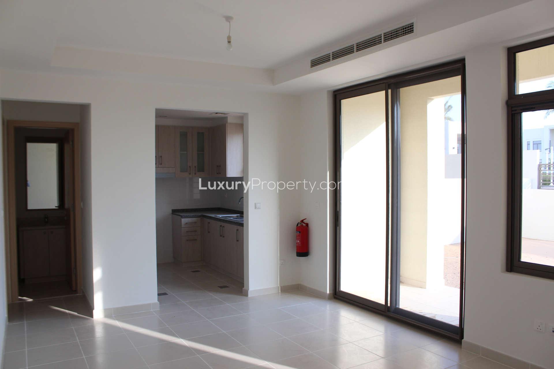 Empty bedroom with built-in wardrobe in Mira Oasis 3 townhouse for rent, Reem community