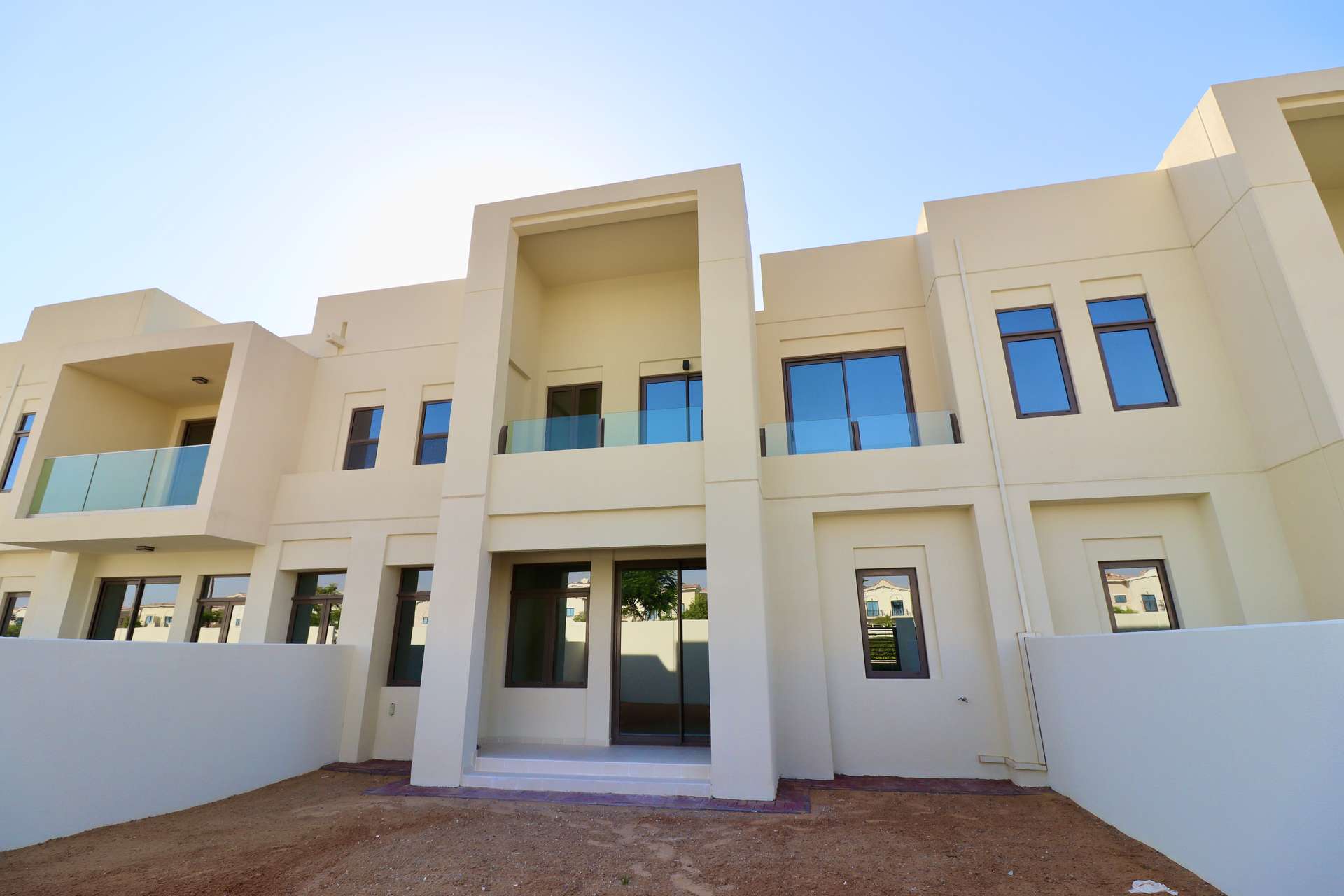 Modern bathroom with dual sinks and bathtub in Mira Oasis 3 townhouse, Reem community