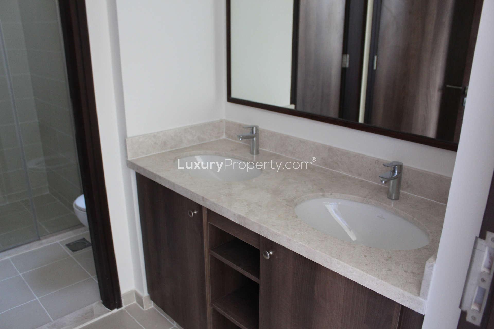 Modern bedroom with built-in wardrobe in Mira Oasis 3 townhouse, Reem community