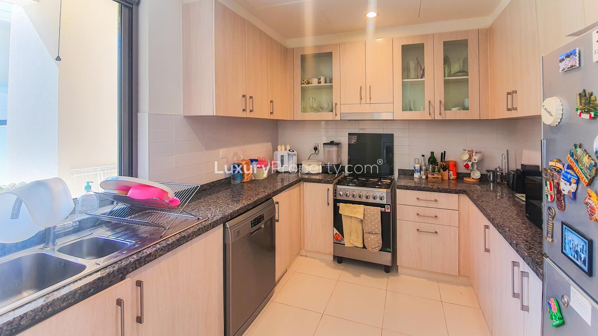 Front entrance and covered parking of 3-bedroom townhouse in Mira Oasis, Reem Community