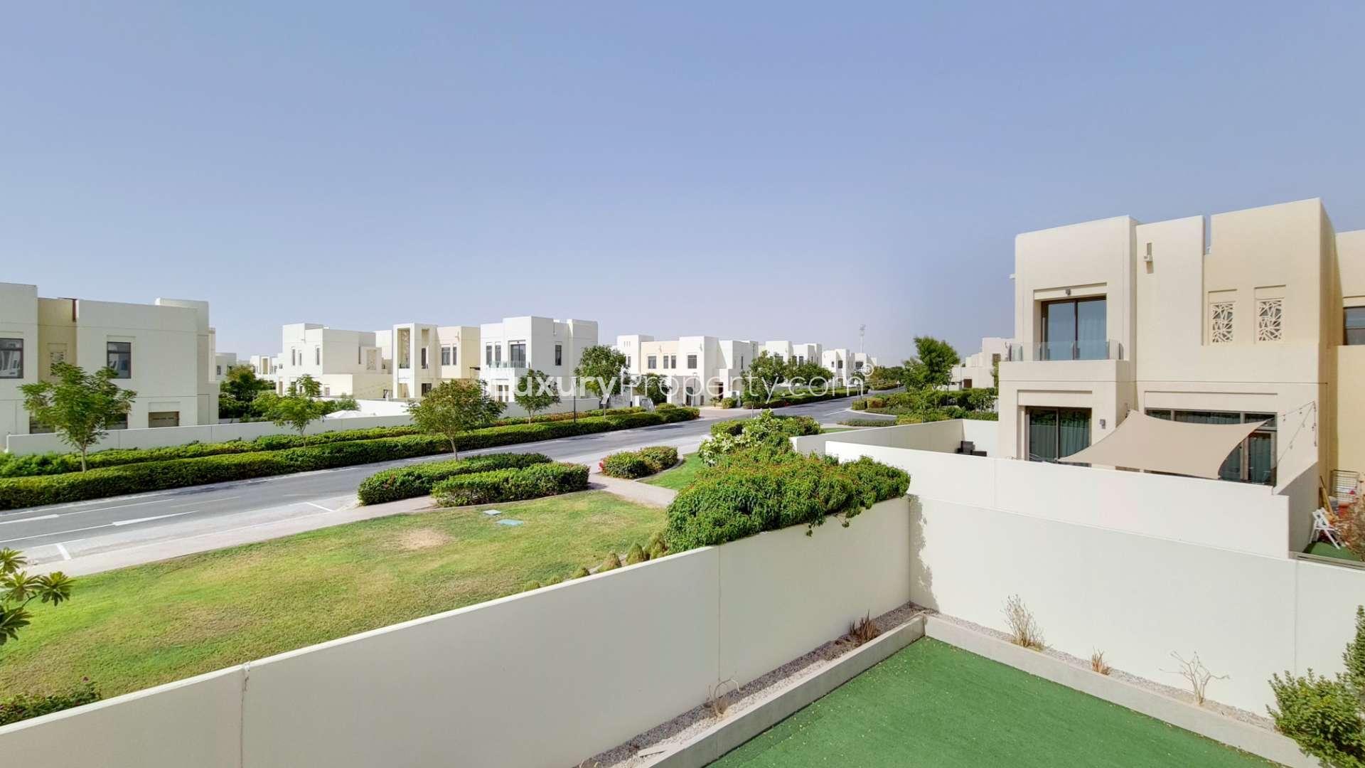 Spacious living room with large windows in Mira Oasis 3 townhouse for rent