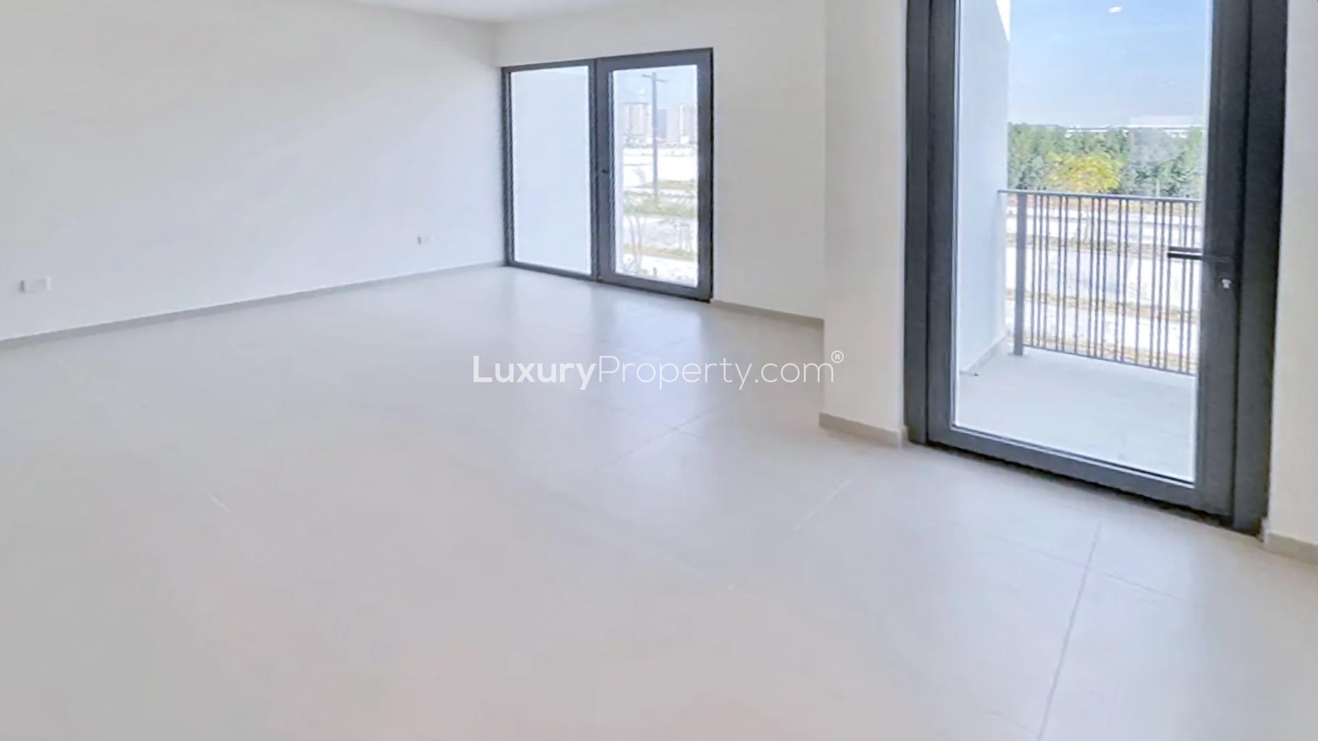 Spacious living area with large windows in Elan townhouse, Tilal Al Ghaf for rent