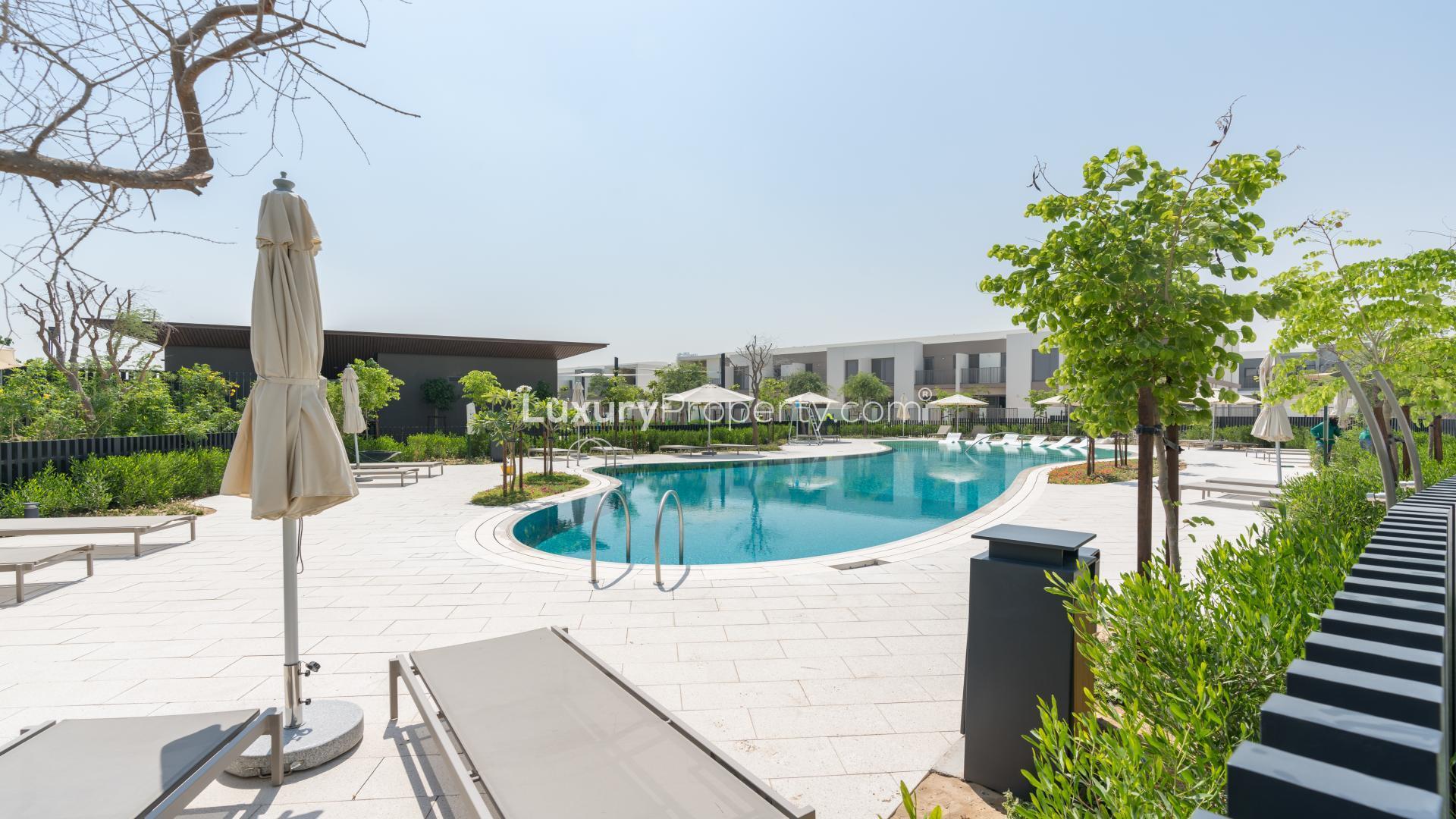 Modern kitchen and living area in 3-bedroom townhouse, Elan, Tilal Al Ghaf for rent